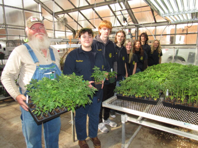 Cameron Farmer, JMHS Students Team Up to Grow 1,000 Tomato Plants